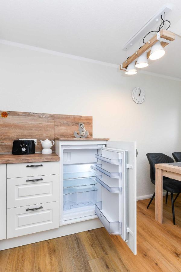 Ferienwohnungen Min Huus Neuharlingersiel Habitación foto