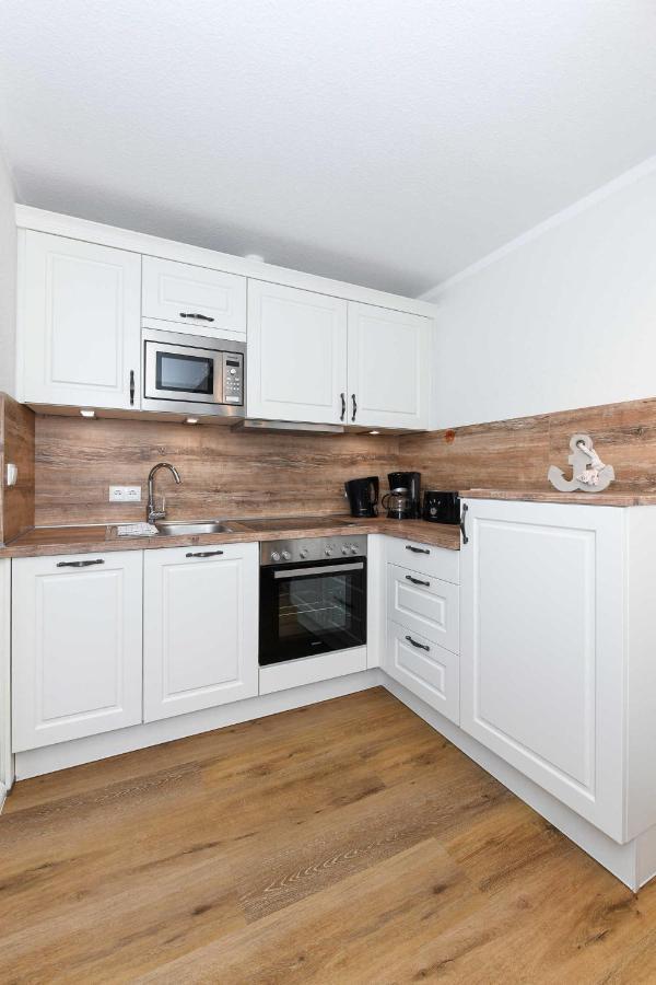 Ferienwohnungen Min Huus Neuharlingersiel Habitación foto