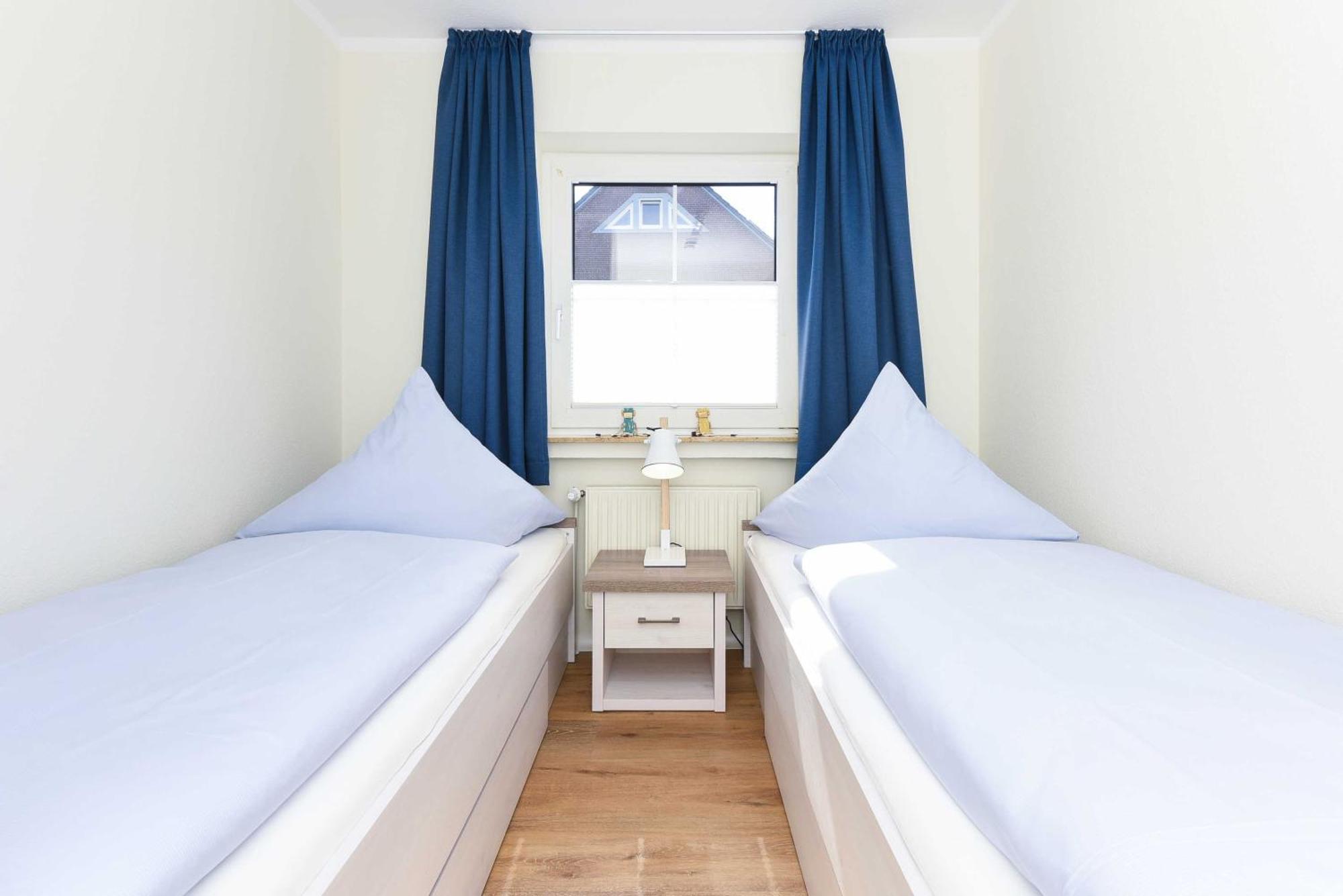 Ferienwohnungen Min Huus Neuharlingersiel Habitación foto